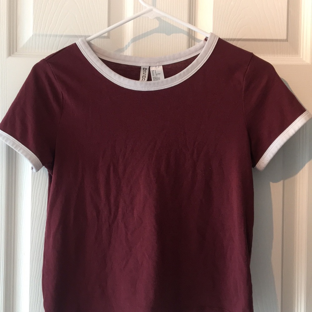 A burgundy baseball tee